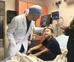 Dr. Gresham Richter with young patient