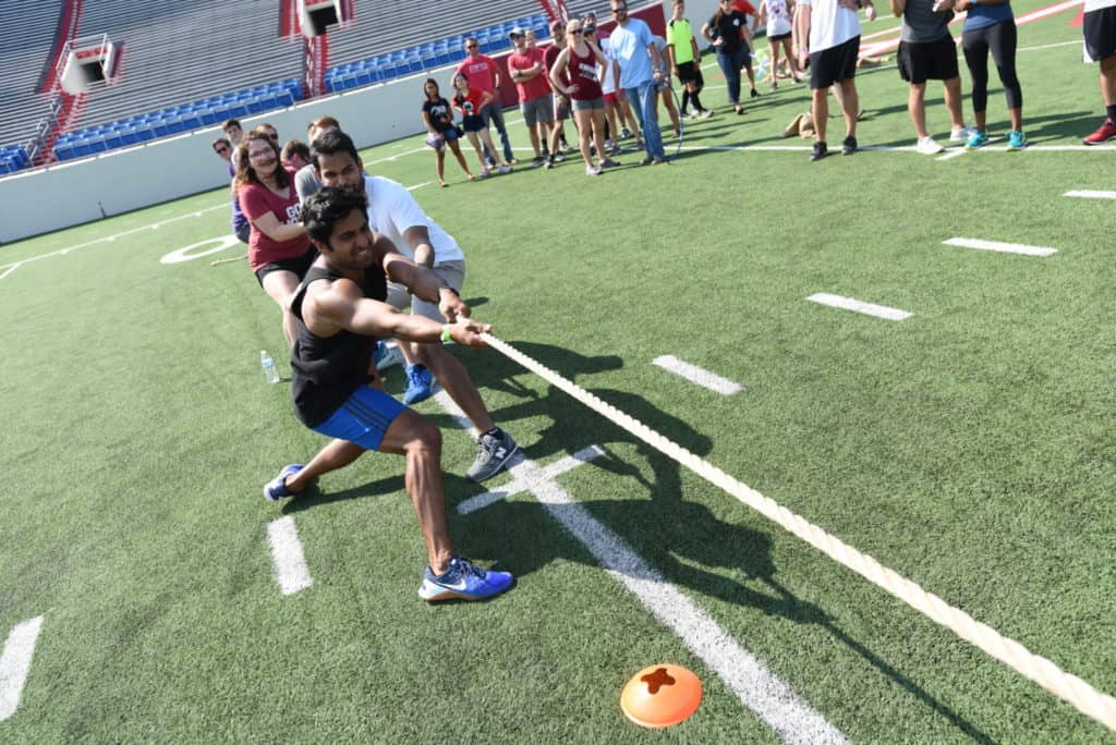 students in a tug of war match