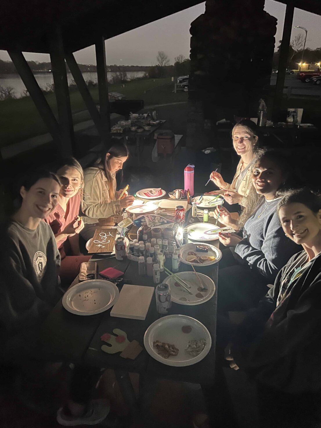 Ish House students around a picnic table