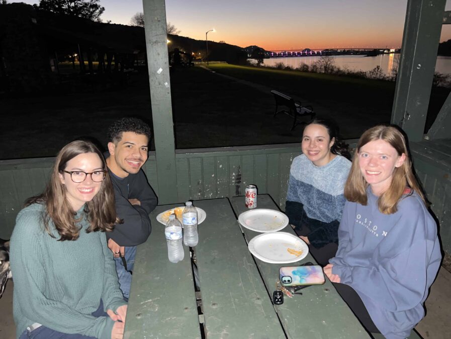 Ish House students around a picnic table