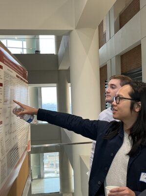 a resident explains their poster