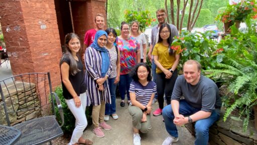 Picture of Kendrick lab members on a patio