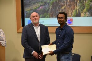 Dr. Eric Peterson with Md. Rafikul Islam