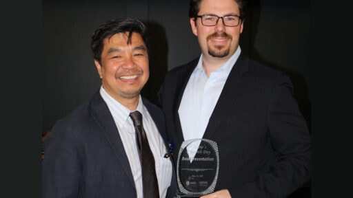 Dr. Yu & Dr. Wooldridge with award