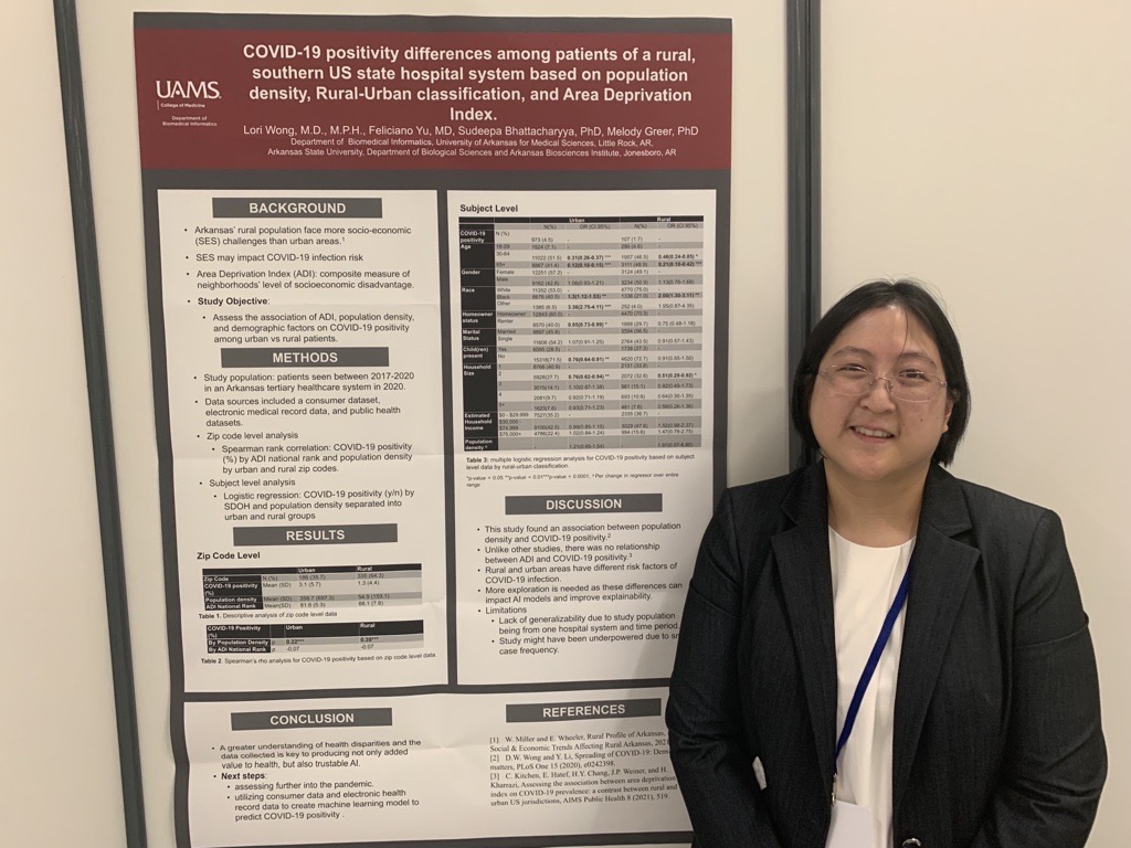 Lori Wong with scientific poster