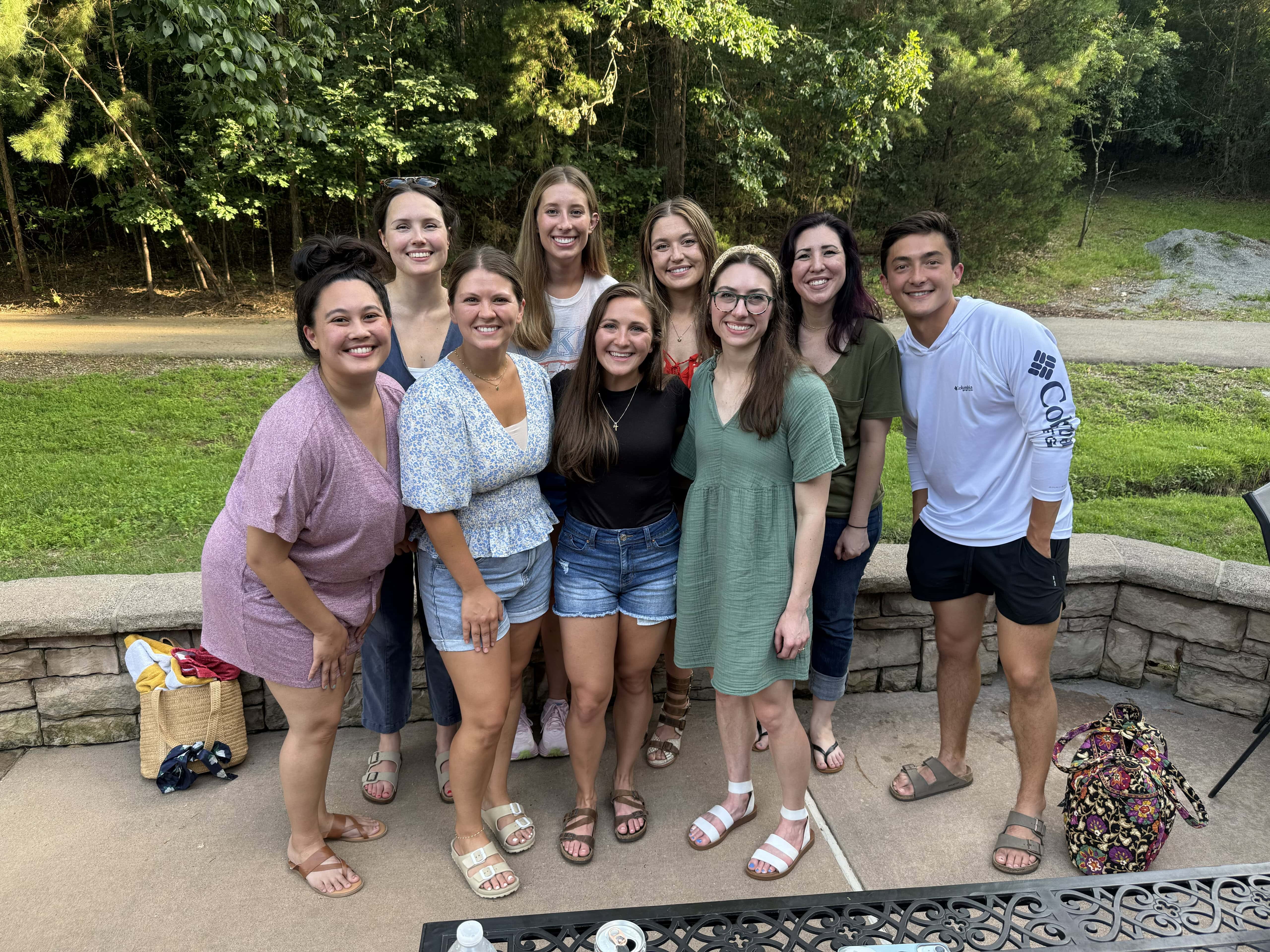 Group photo of PGY-1 residents. The group is outdoors in casual clothing.