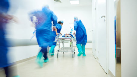Doctors running to surgery