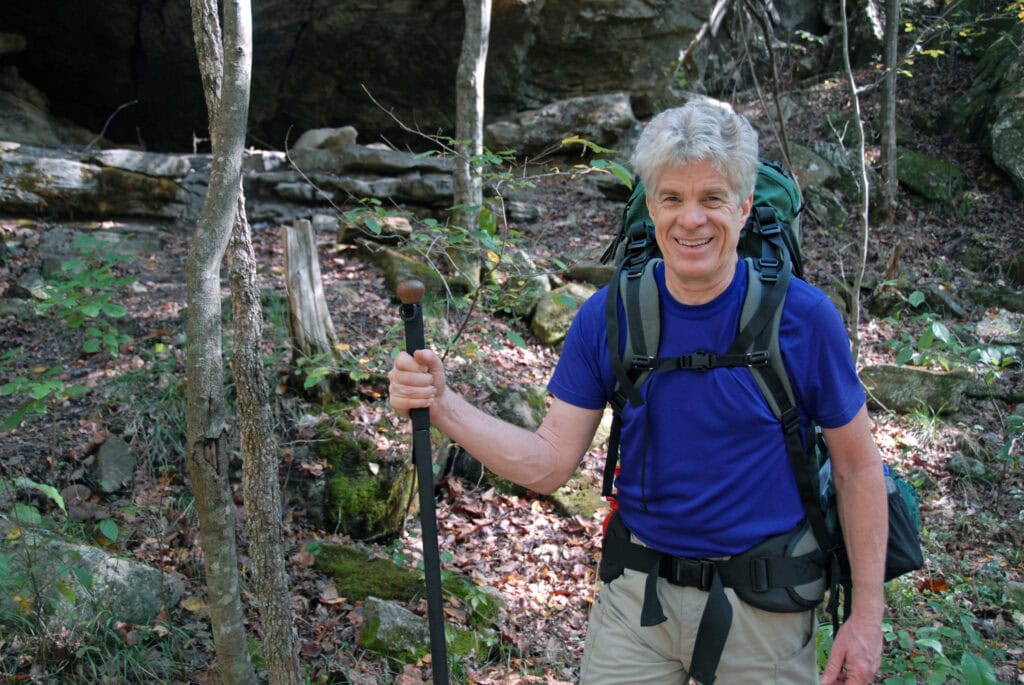 Early-50s healthy hiker sets off for a bit of backpacking in the Ozark Mountains of Arkansas, USA.