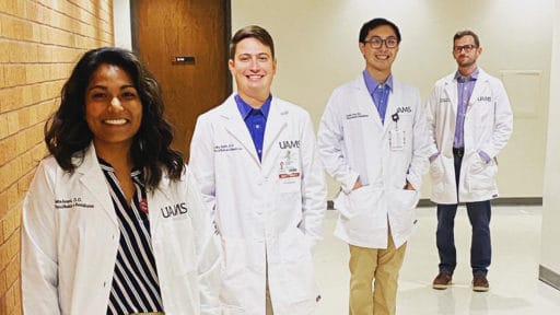PMR Residents posing in a hallway