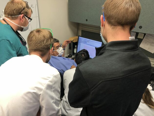 Dr. Paydak instructing residents about EKGs