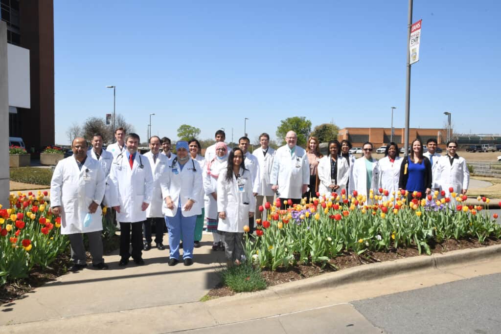 group photo of Nephrology faculty and staff, taken outside the medical center