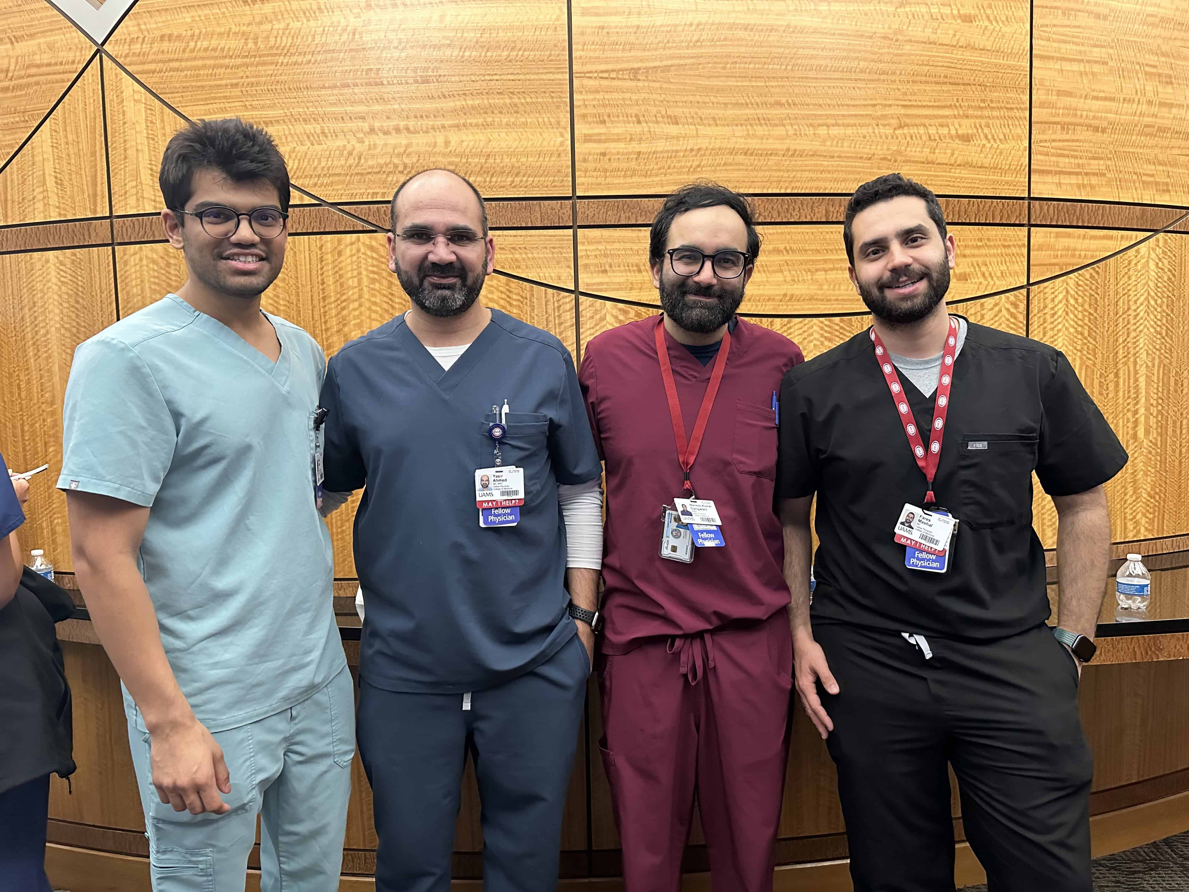 Four internal medicine doctors pose at the Gut Club event