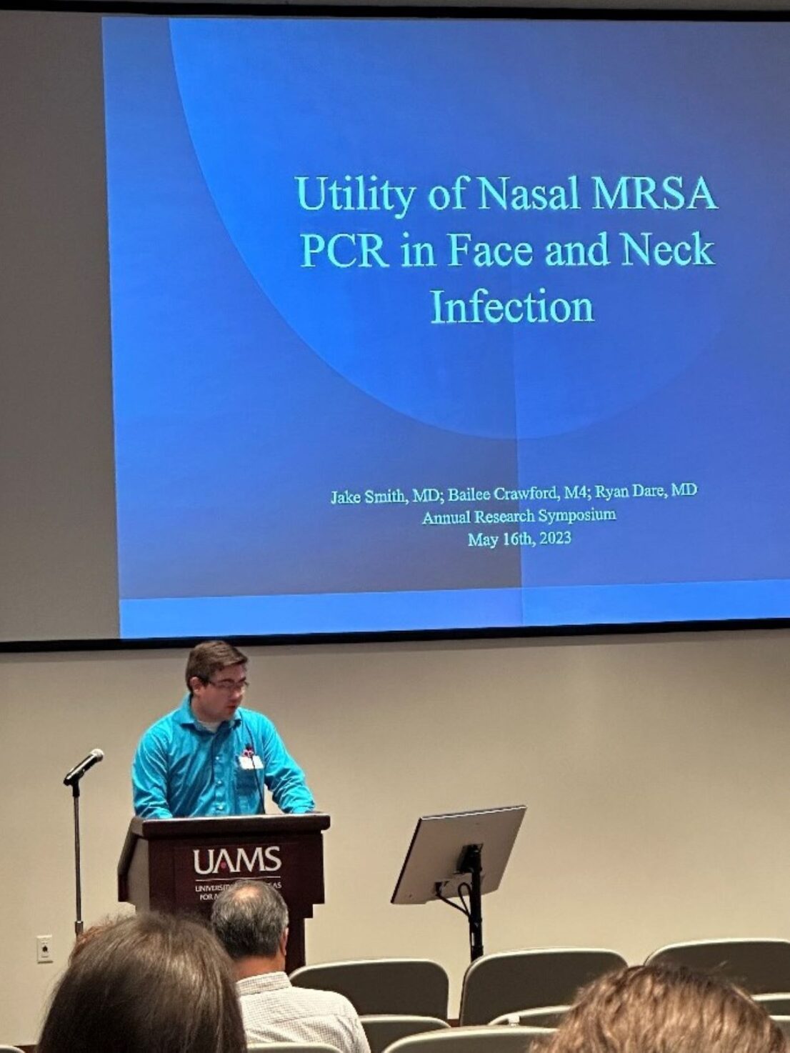 Jake Smith presenting the research oral presentation on Utility of Nasal MRSA PCR in face and neck infection.