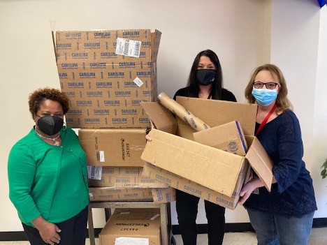 Mabelvale Middle School teachers Heidi Campbell (right) and Misty Ingram (center) and their Principal (left) posing with their ArkanSONO 2022 STEM grant supplies.