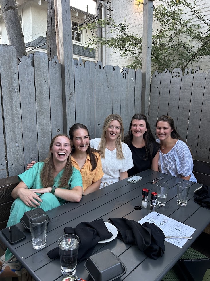 a group of female residents at dinner