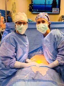 residents performing surgery