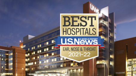Exterior of UAMS Medical Center with US News logo superimposed