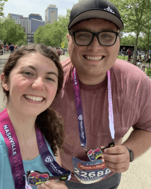 Hannah Cutshall with fiance after a marathon