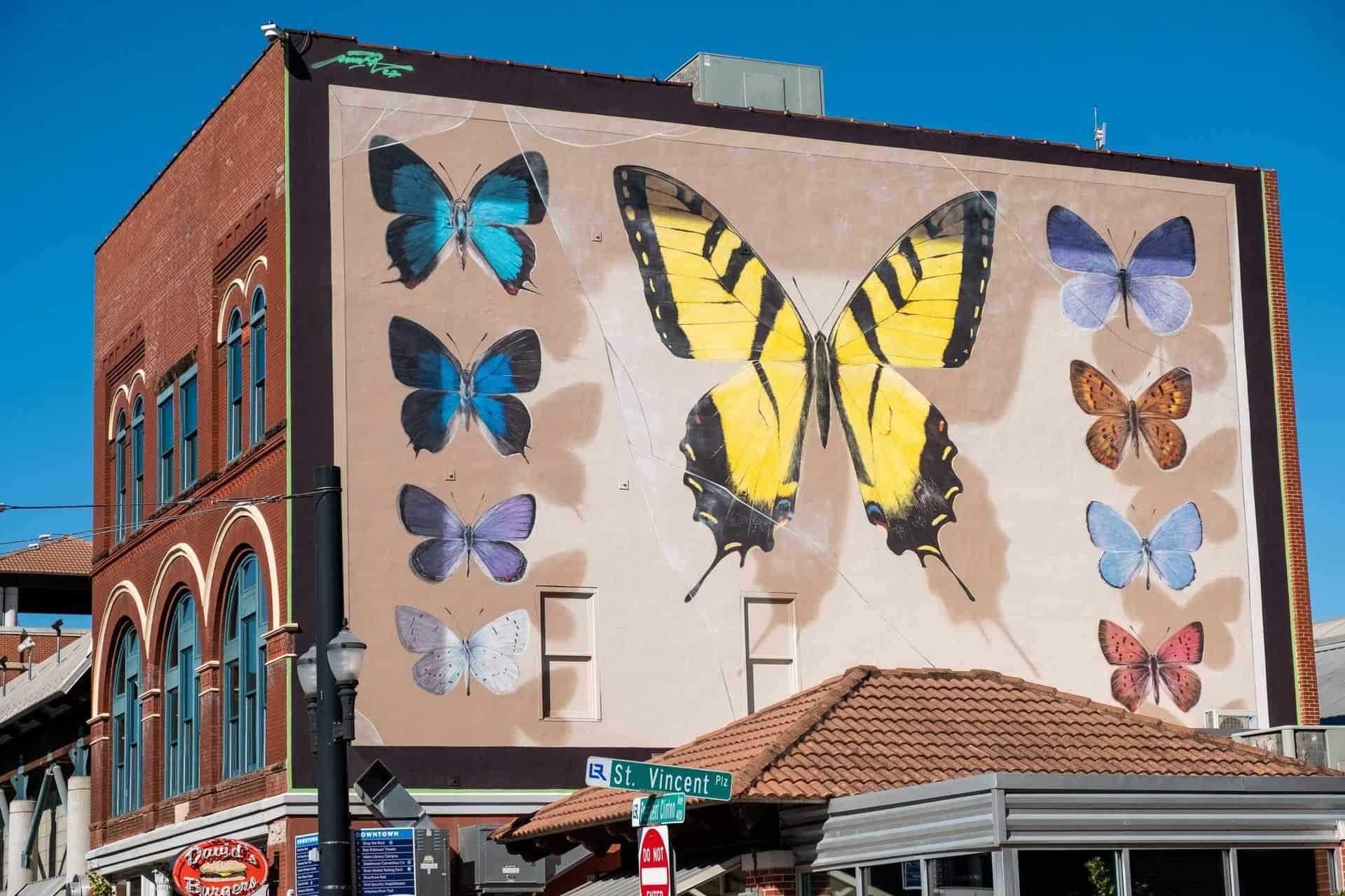 A mural of Arkansas butterflies painted on the side of the River Market Hall in downtown Little Rock