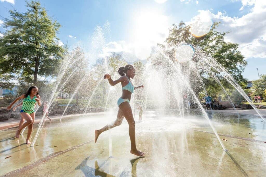 Children playing in the water at the Peabody Splashpad