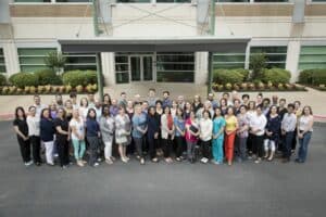 The Arkansas Children's Nutrition Center investigators and staff gather in front of the building's entrance