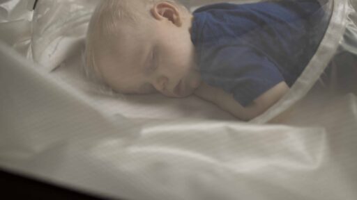 Child sleeping inside medical device