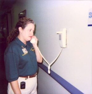 Dr. Michele Moss coordinates patient transport over the phone