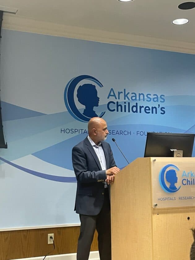 Dr. Ashish Kumar speaks to the audience in Children's Hall during ACRI Research Week 2023.