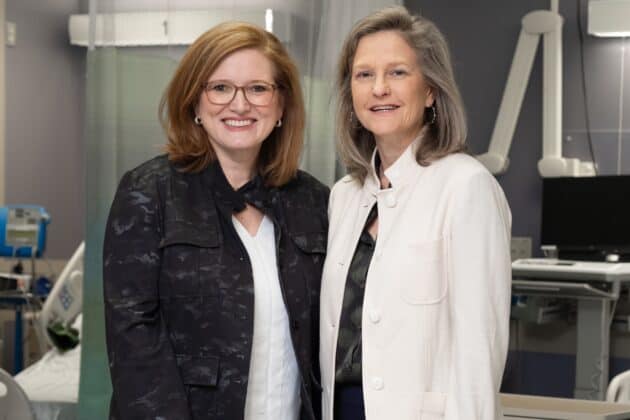 Amy Scurlock, M.D. and Stacie Jones, M.D. pose together in a patient room at ACRI