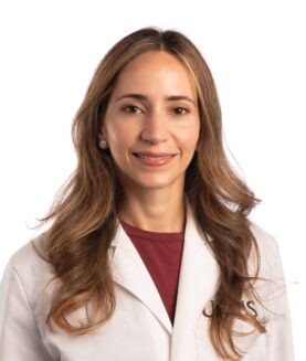 Lina Al-Jaberi, M.D. Dr. Lina Al-Jaberi headshot in white lab coat