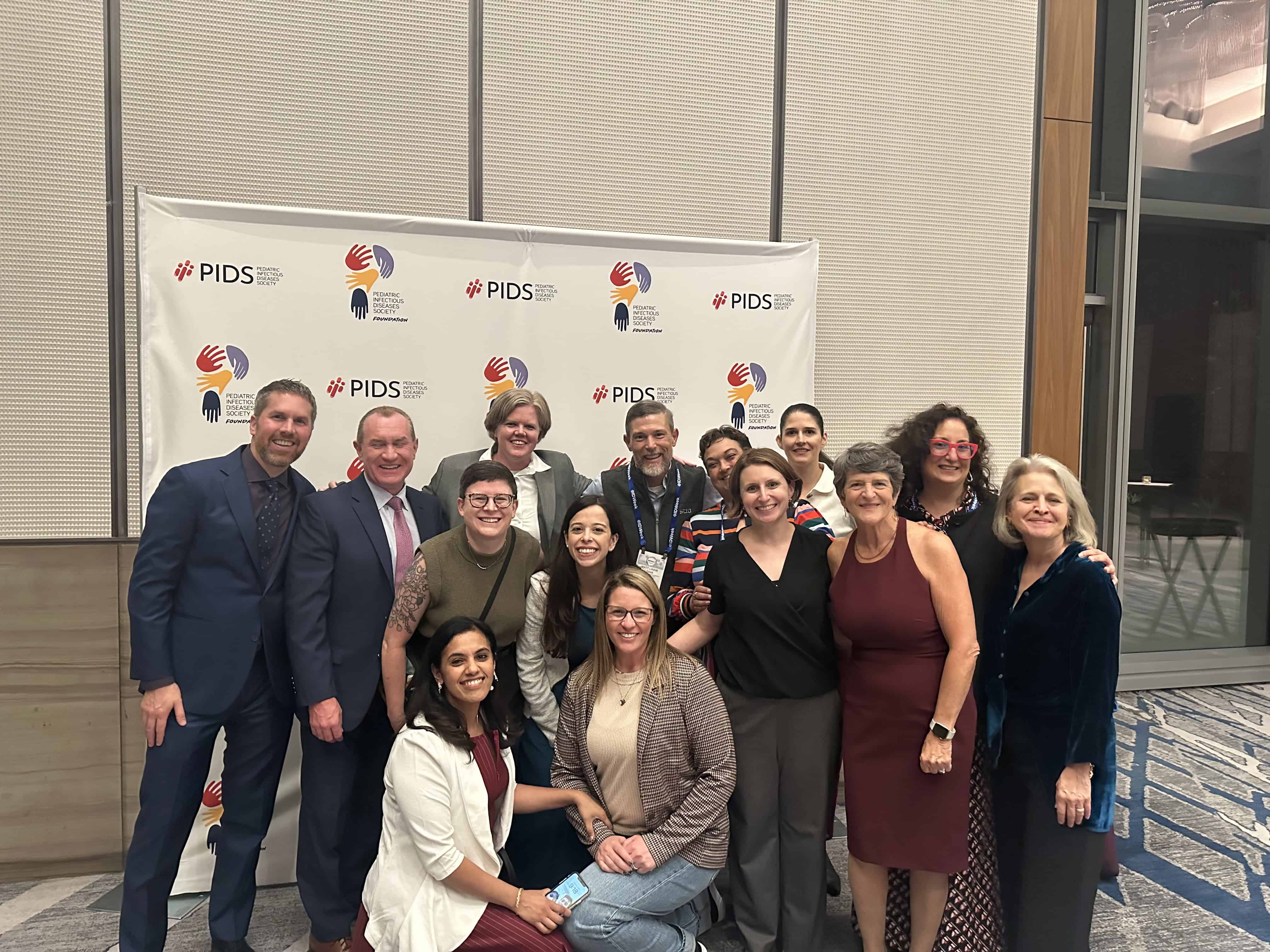 Infectious Diseases Faculty standing together at conference
