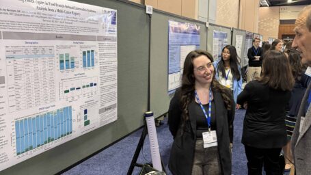 Dr. Emily Seminara presenting a poster at the American Academy of Allergy, Asthma and Immunology Annual Meeting in 2026