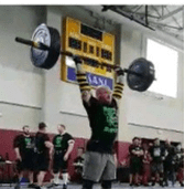 Dr. Fantegrossi lifting weights at competition
