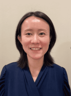 Yunmeng Liu, Ph.D. Photo of Dr Liu, shoulder length balck hair and in a blue wrap top