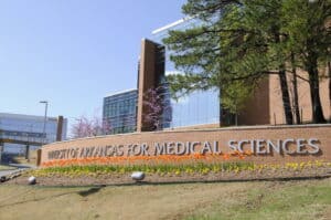 UAMS Sign in front of the I. Dodd Wilson building on the UAMS Little Rock campus