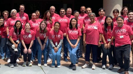 Department photo in front of Bio Med building