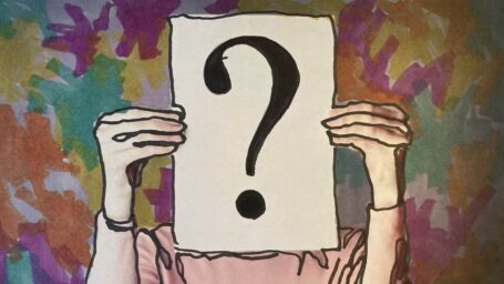 Picture of a question mark in front of someones face hiding it