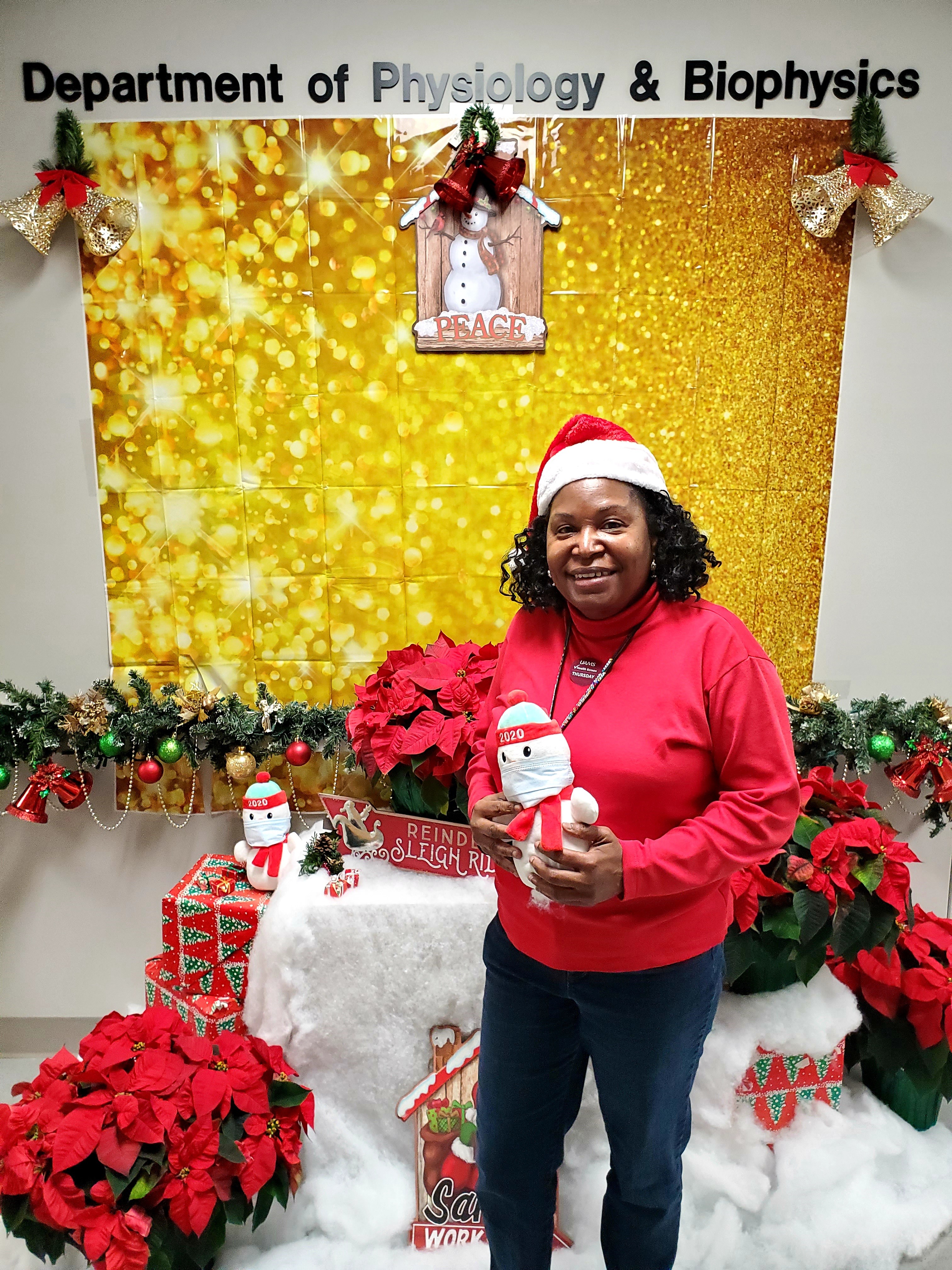 Lee in front of the holiday display