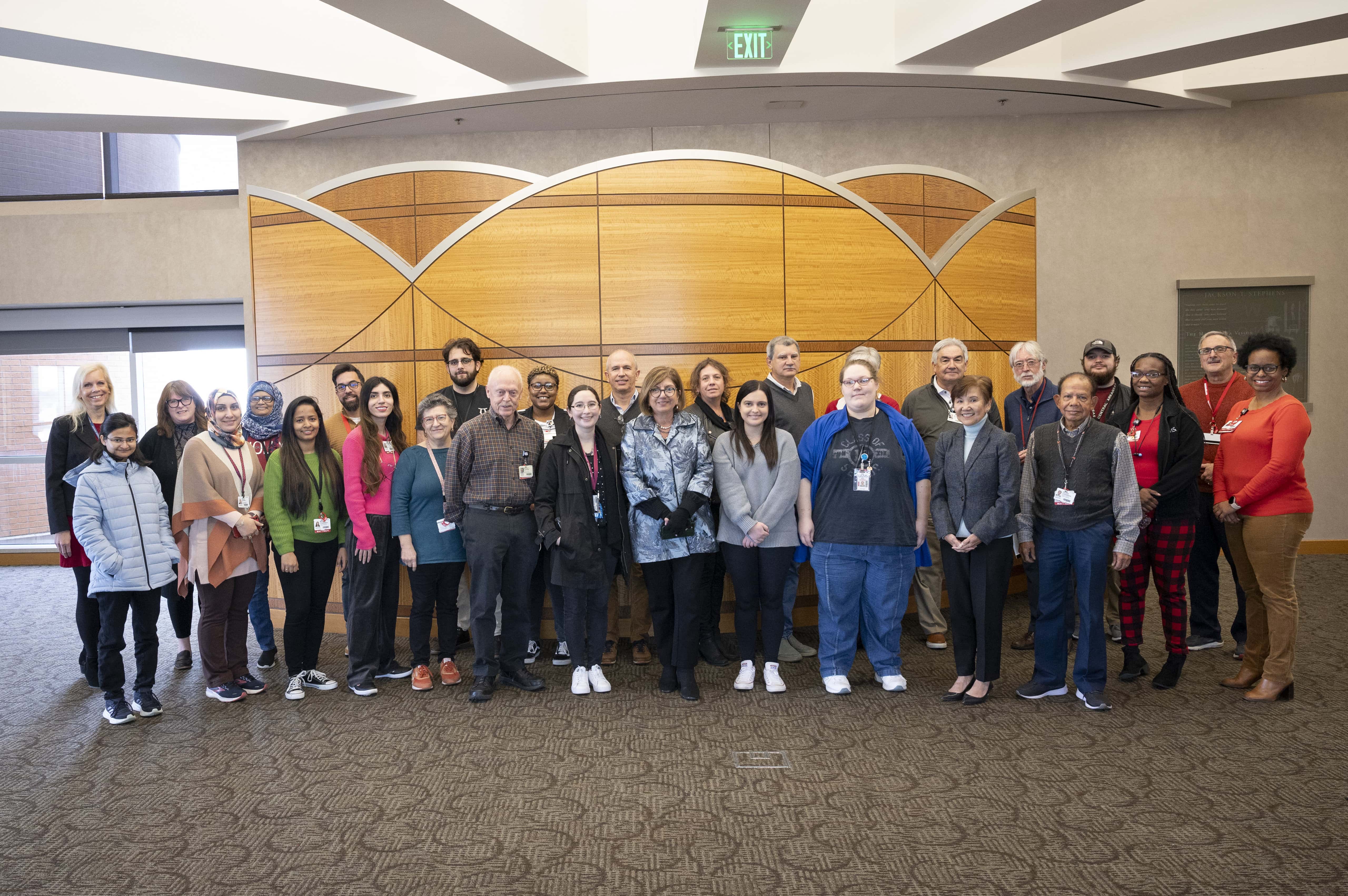 2023 Department Town Hall meeting with picture of faculty staff and students in the department