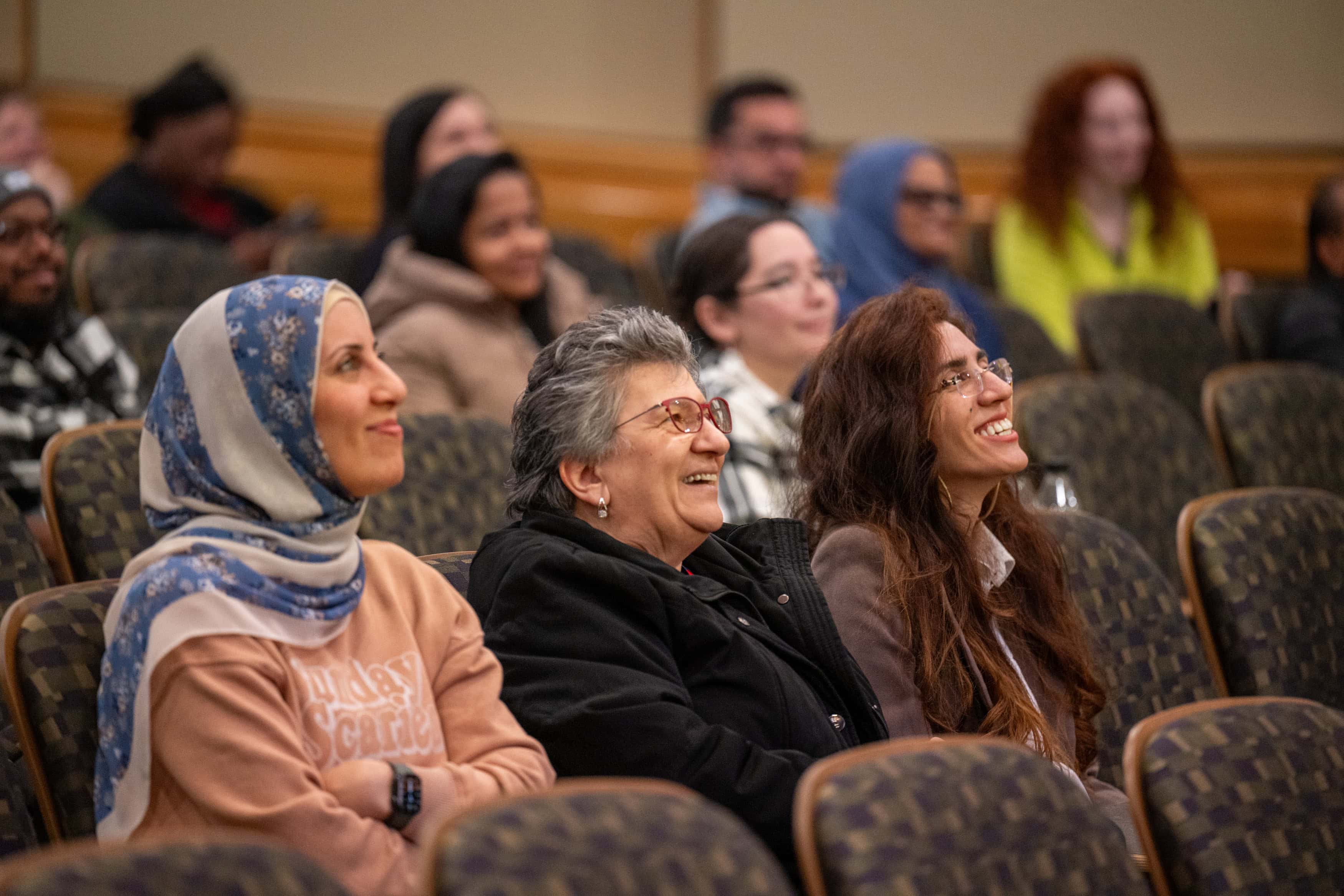 Faculty members listening in the audience