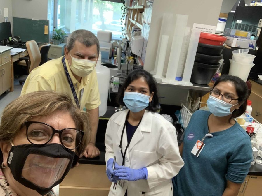 Dr. Bellido in the Lupashin Lab, everyone wearing masks