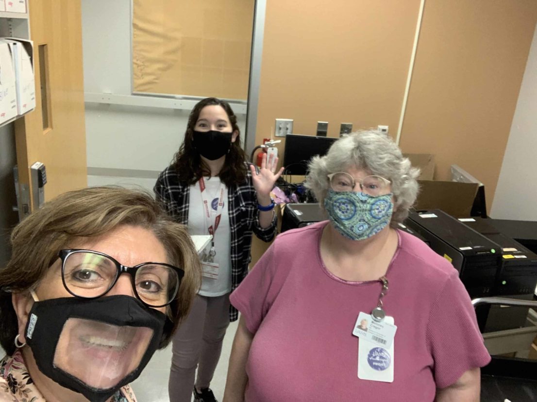 Dr. Bellido with her masked lab staff