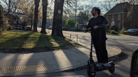 Kyle McKenna aboard his scooter