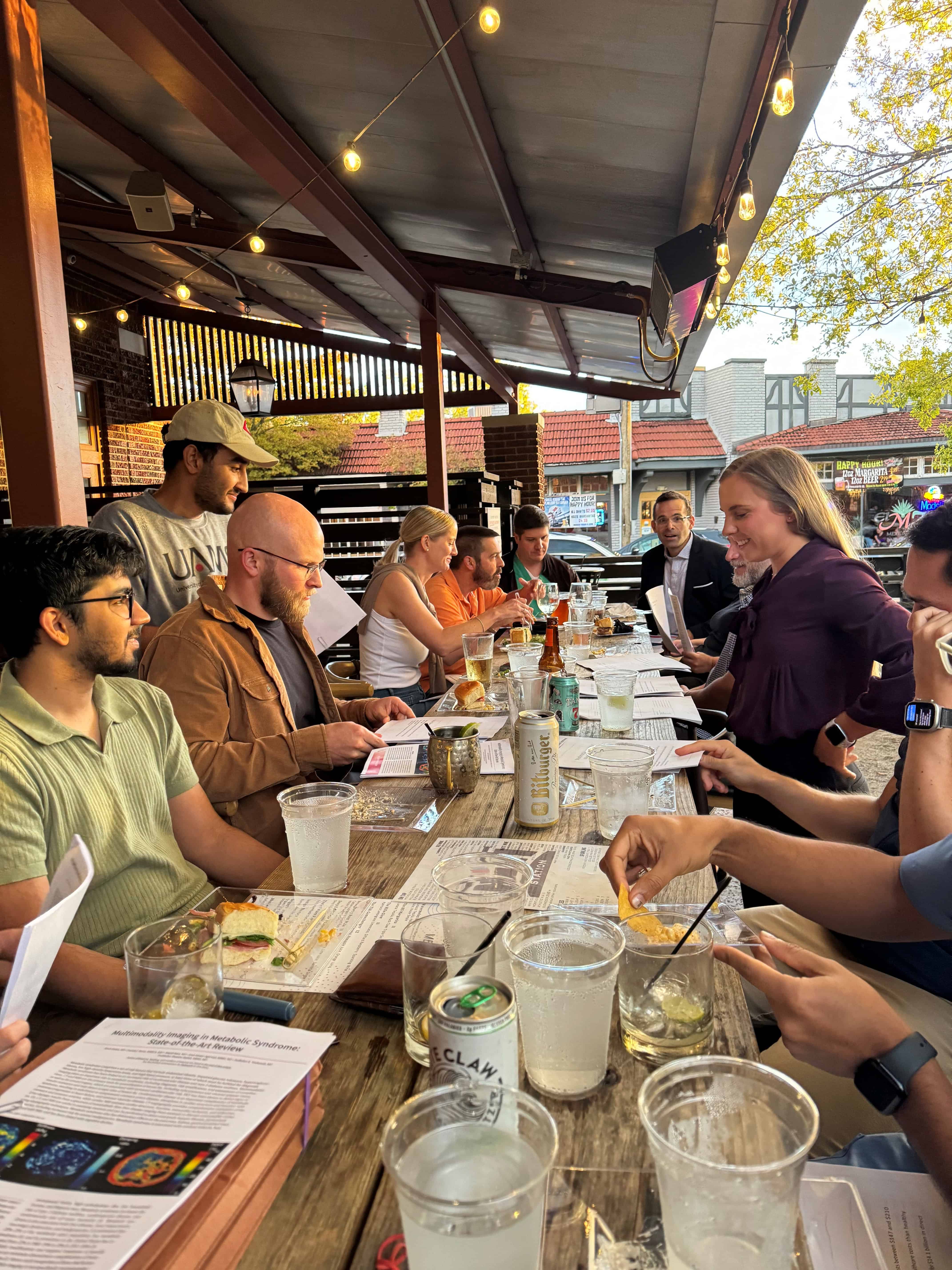 Photo of residents sitting around table, Journal Club Hill Station Sept 2024