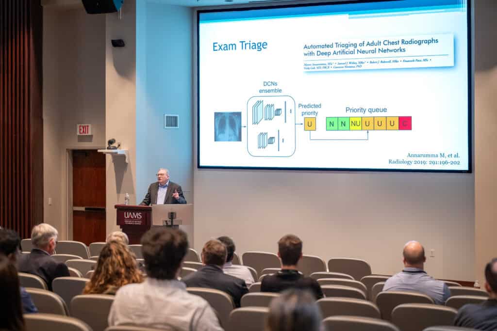 Photo of Dr. Kahn giving a talk.