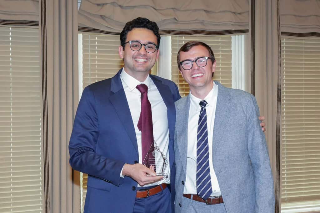 Photo of someone receiving an award.