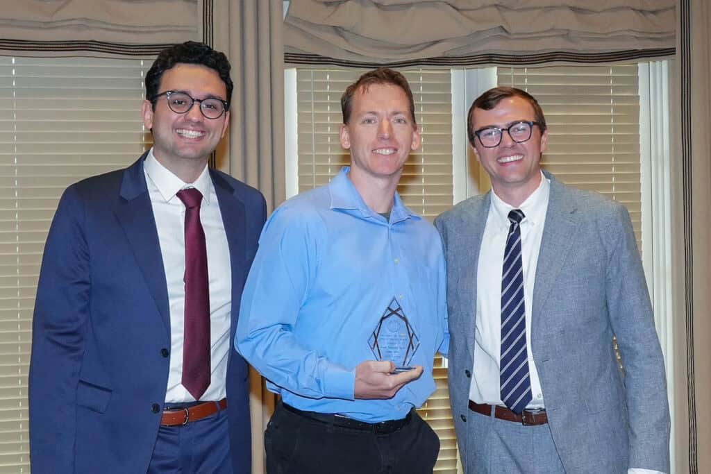 Photo of someone receiving an award.