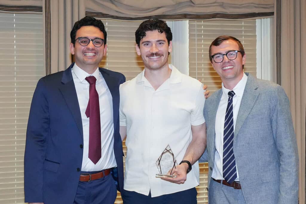 Photo of someone receiving an award.