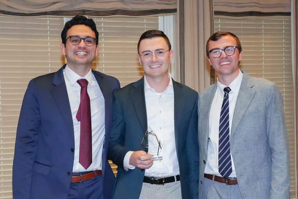 Photo of someone receiving an award.