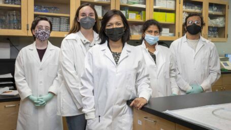 image of students wearing masks in a lab